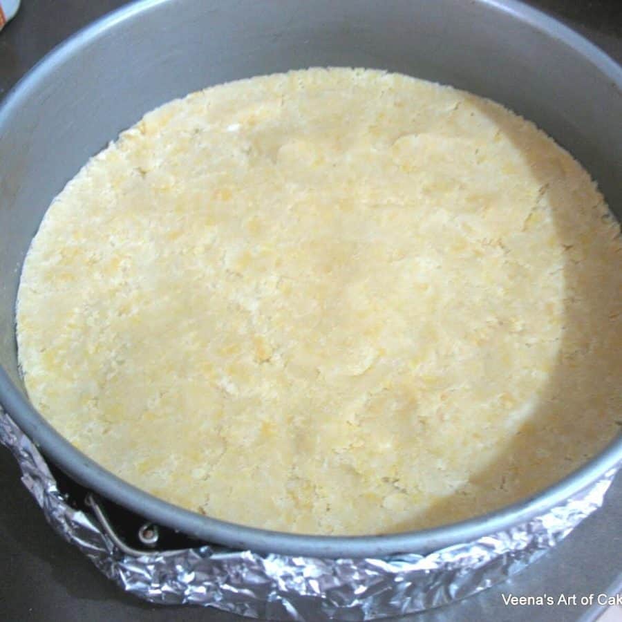 A springform pan with unbaked crust on display