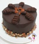 This chocolate ganache chocolate cake is really decadent and truly a chocolate dream made with a flourless chocolate cake base, filled with chocolate ganache, drizzled with more chocolate and then pipped with more chocolate swirls.