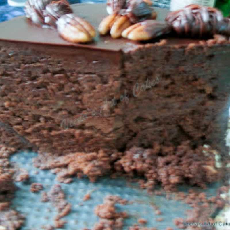 This chocolate ganache chocolate cake for a true chocolate lover. Delicious layers of rich chocolate cake frosted with chocolate ganache and glazed with chocolate glaze for that ultimate finish. Whether you make this for a birthday celebration or for a simple weekend dinner. This chocolate cake is truly a dessert to be enjoyed guiltfree. An image optimized for social media share for this chocolate ganache chocolate cake recipe a true chocolate lovers dream cake.