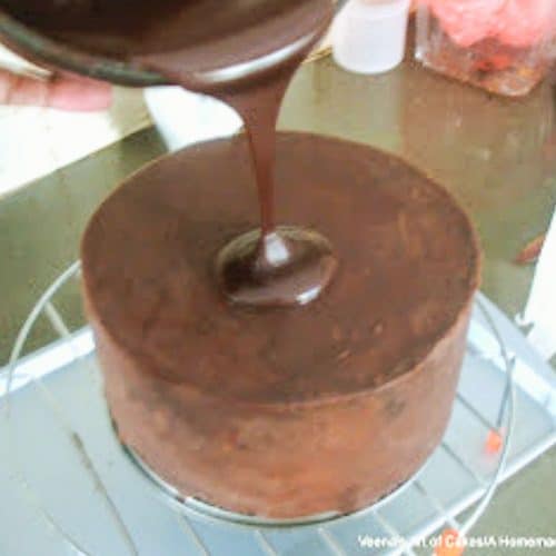 An image optimized for social media share for this chocolate ganache chocolate cake recipe a true chocolate lovers dream cake.