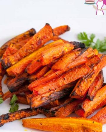 Baked carrots on a white plate