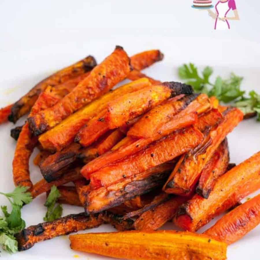 Baked carrots on a white plate