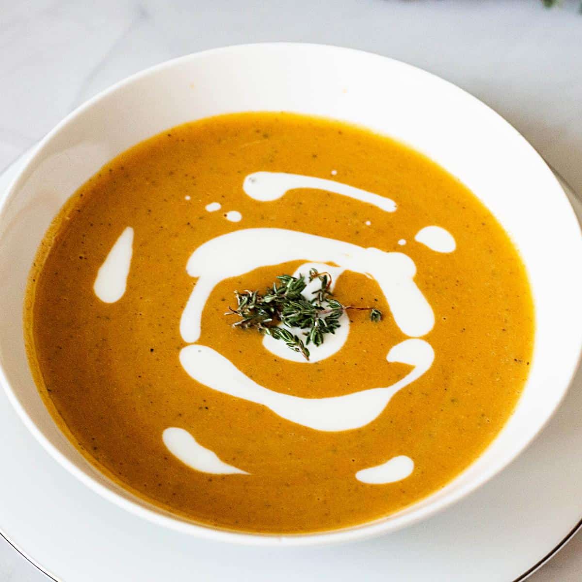 A bowl with butternut soup.
