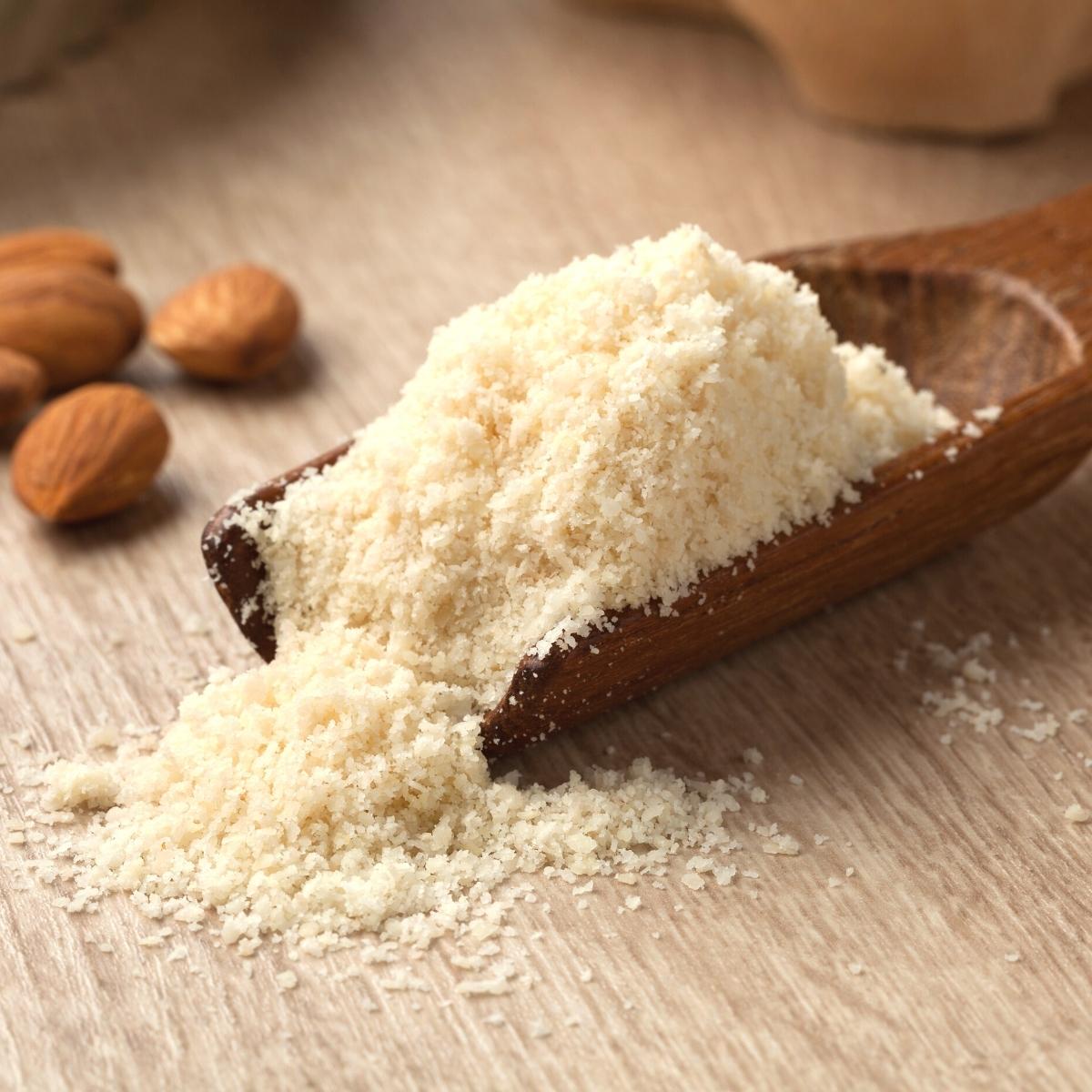 Almond meal in a measuring spoon.