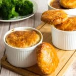 Chicken Pie Soup with carrots, celery, peas and topped with classic puff pastry