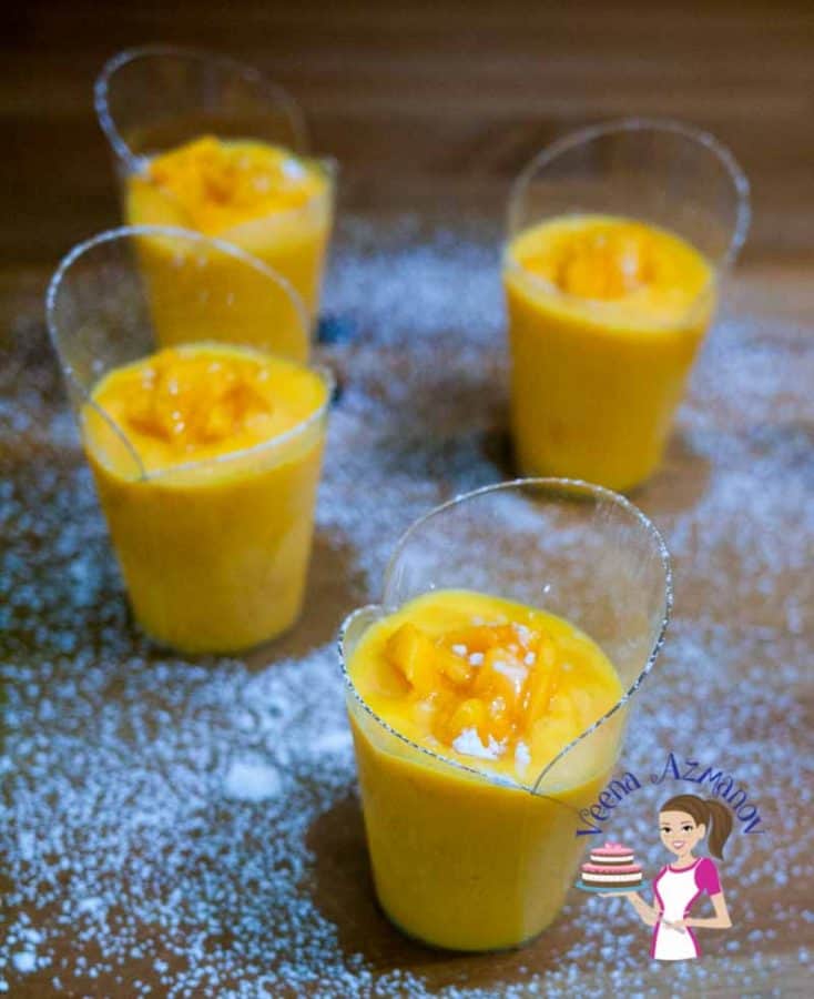 Cups of mango mousse.