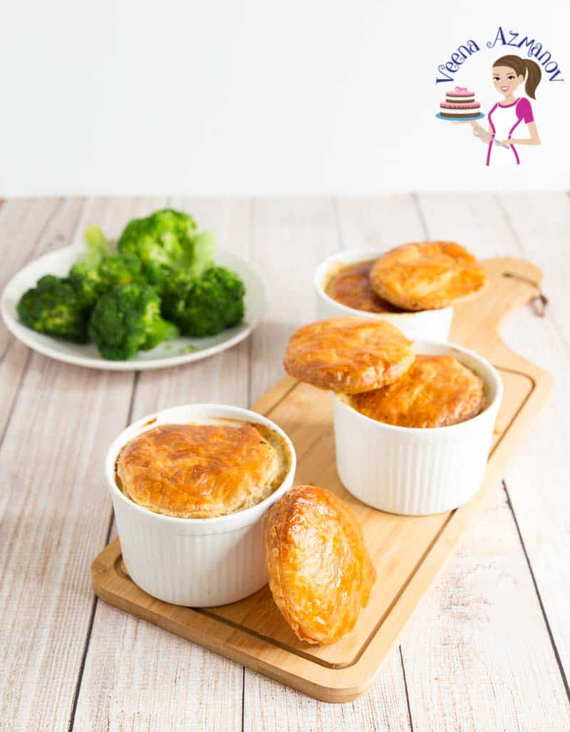 Chicken Pie Soup with carrots, celery, peas and topped with classic puff pastry