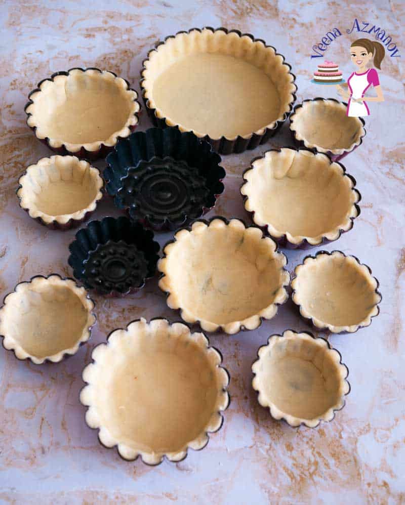mini tart molds with unbaked dough
