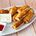 A plate with ground beef puffs.