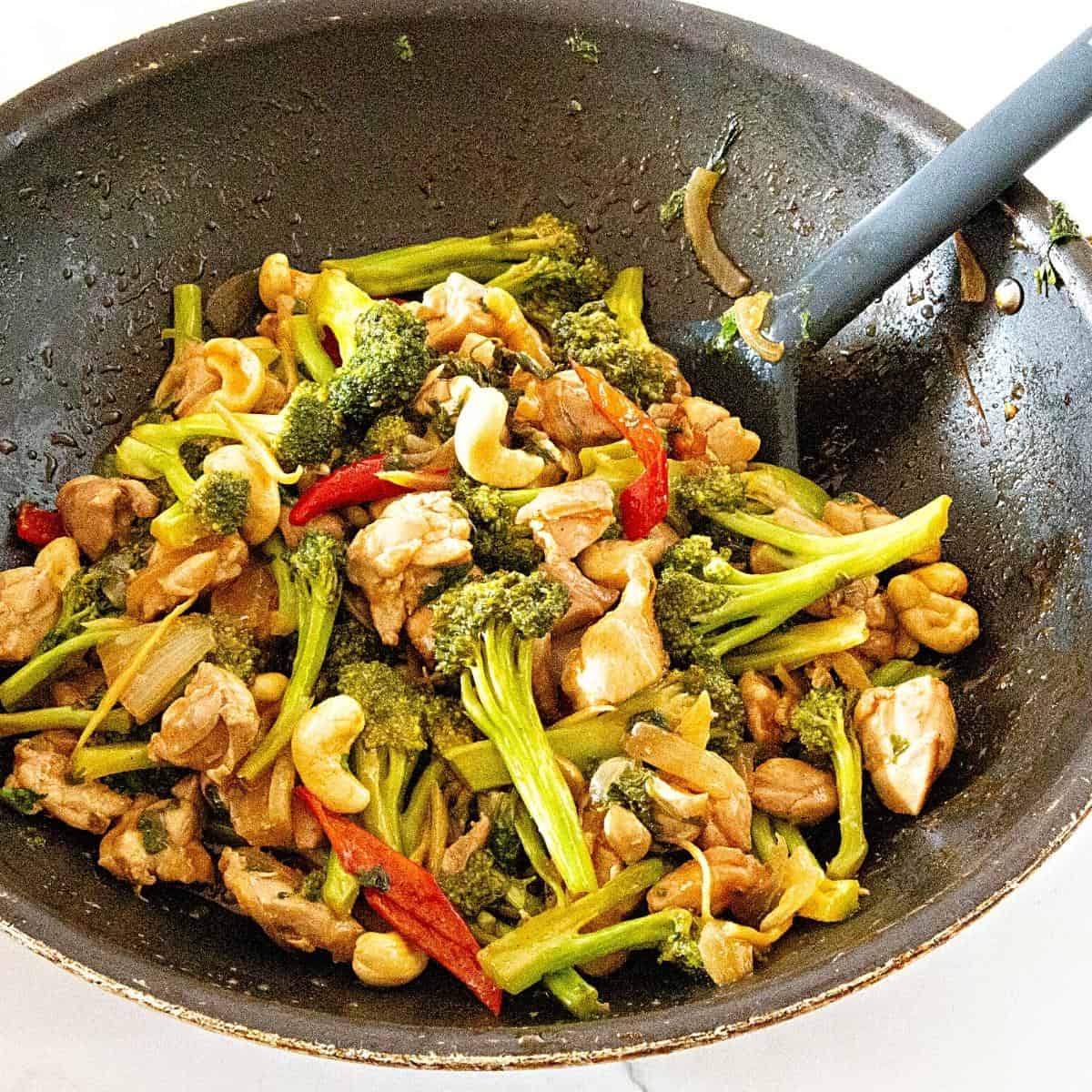 Stir fry in a skillet with broccoli.
