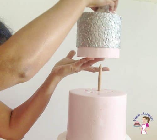 How do you dowel a cake correctly before stacking it