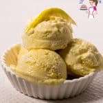 4 scoops of lemon ice cream in a bowl.