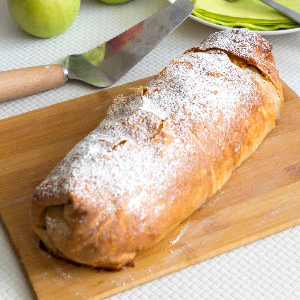 A baked strudel on the table.