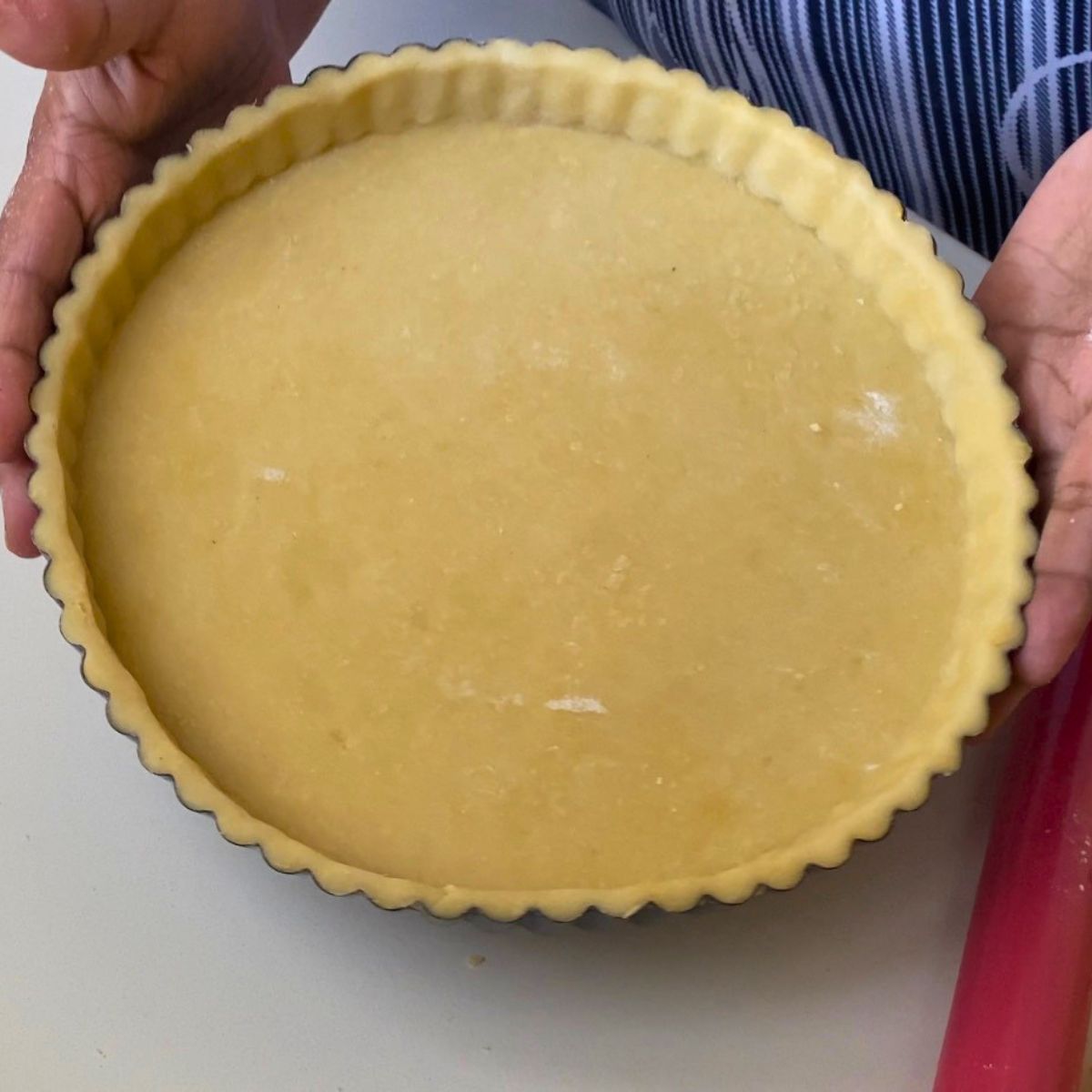 A tart shell ready for baking.