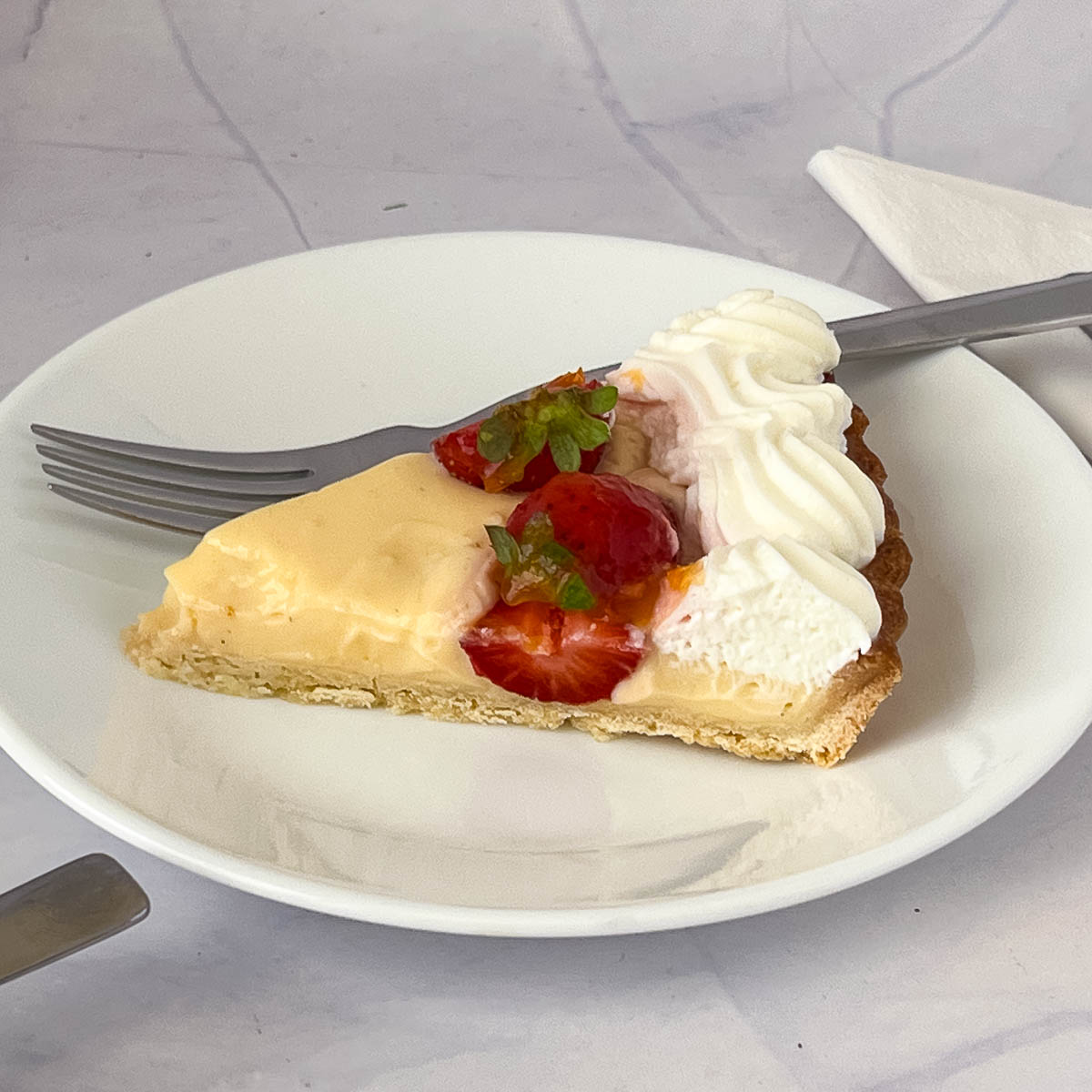 A slice of strawberry tart.