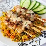 Thai skewers over rice.