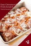 Cinnamon rolls in a rectangle baking pan.