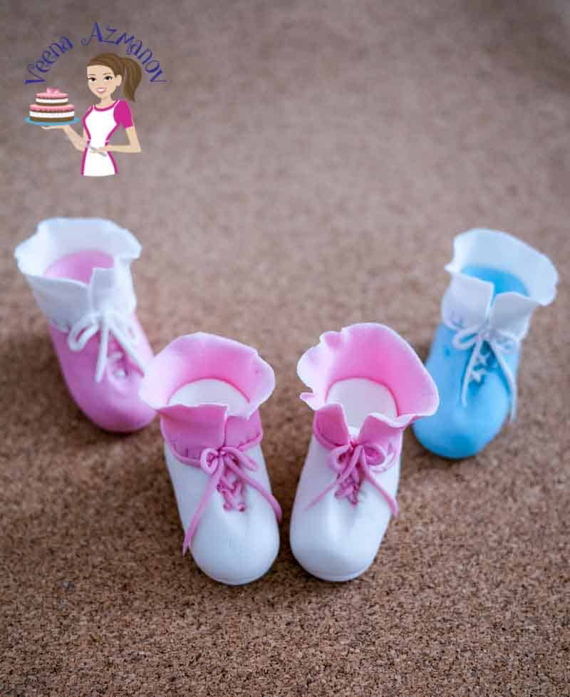 Baby booties made from sugar paste.