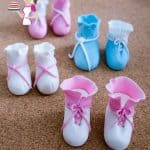 Baby booties made from sugar paste.
