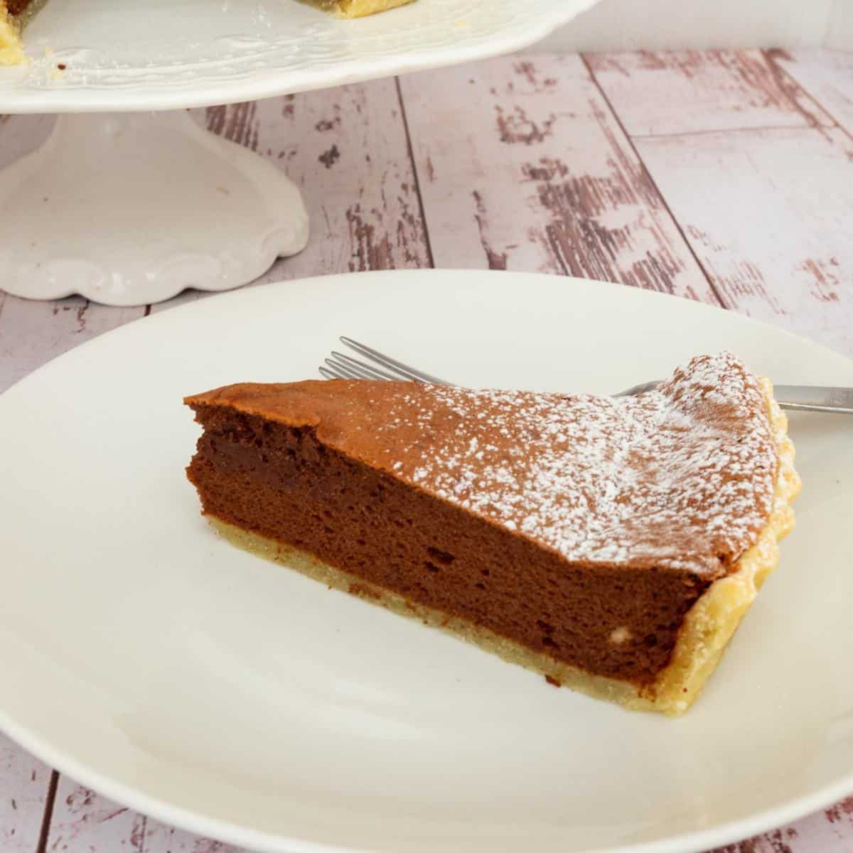 A slice of baked souffle tart.