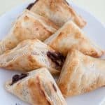 A plate of puff pastry with chocolate filling.