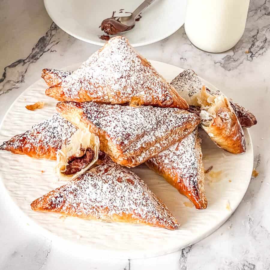 Puff pastry filled with nutella dusted with powdered sugar.