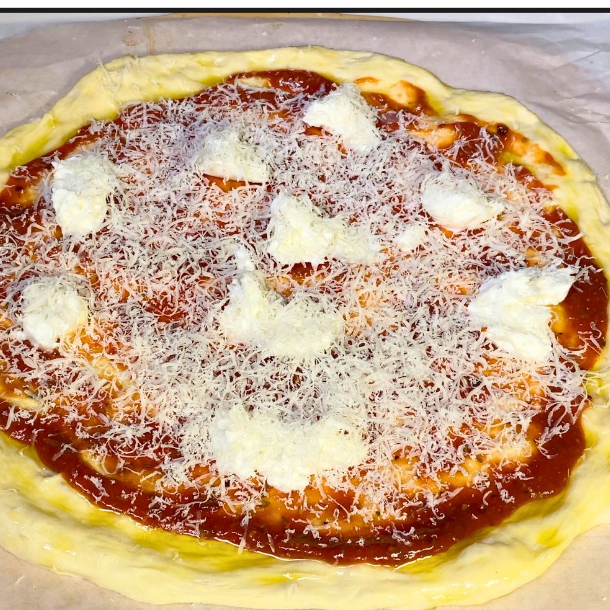 Margherita pizza ready for baking.