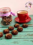 An image optimized for social media share for these crumbly chocolate pecan cookies video recipe that take no more than 15 minutes from start to finish.