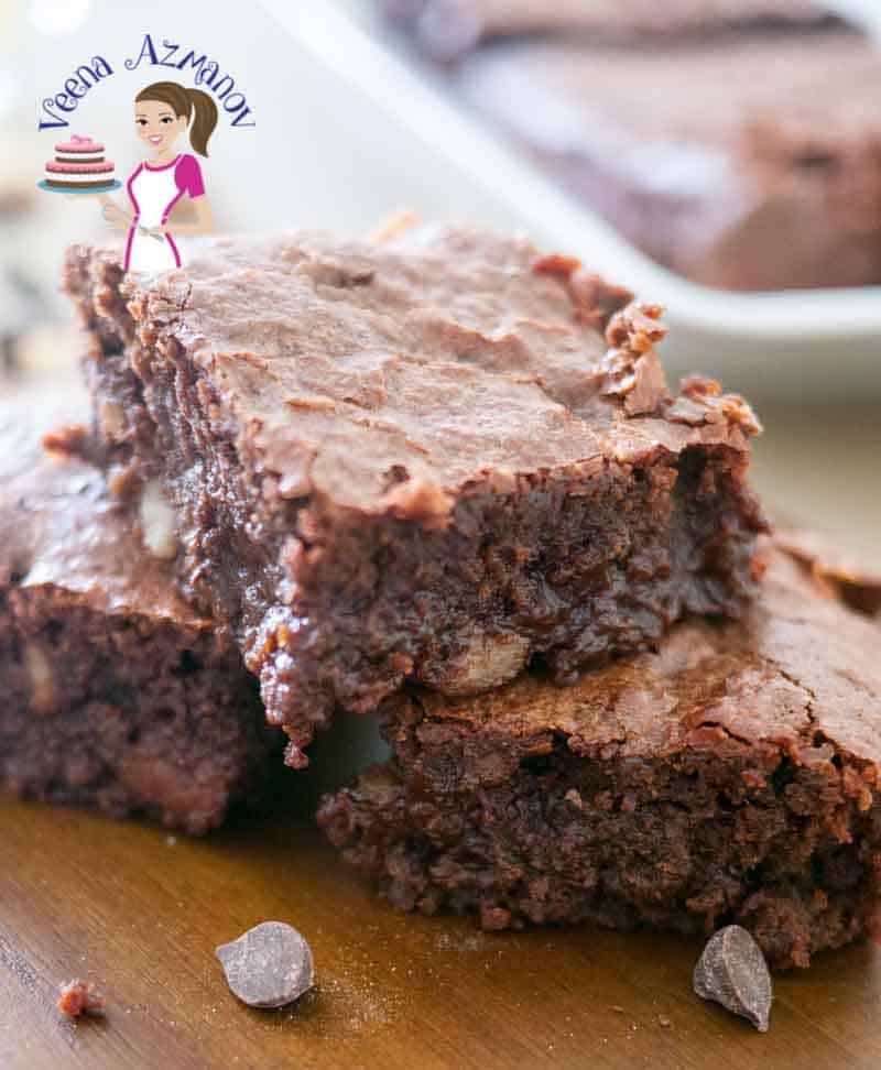 A social media optimized image for dark chocolate brownies, this chocolate brownies is to die for with a light crisp top and soft melt in the mouth fudge center. A chocolate brownie which is a chocolate lover's ultimate dessert.