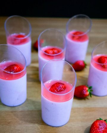 Dessert cups with bavarian cream and strawberry jello.