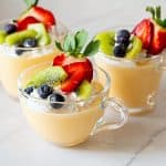 Vanilla pudding in dessert cups.