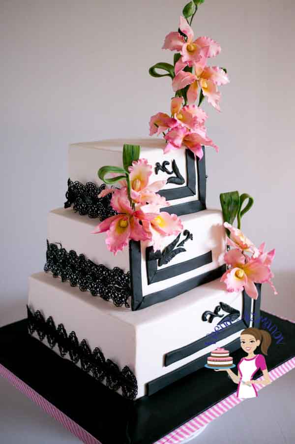 A decorated cake with sugar flowers.