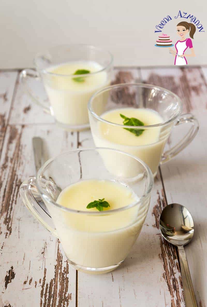 Cups of vanilla pudding.