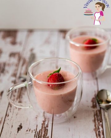 Two cups of strawberry pudding.