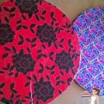 Cake boards covered in wrapping paper.