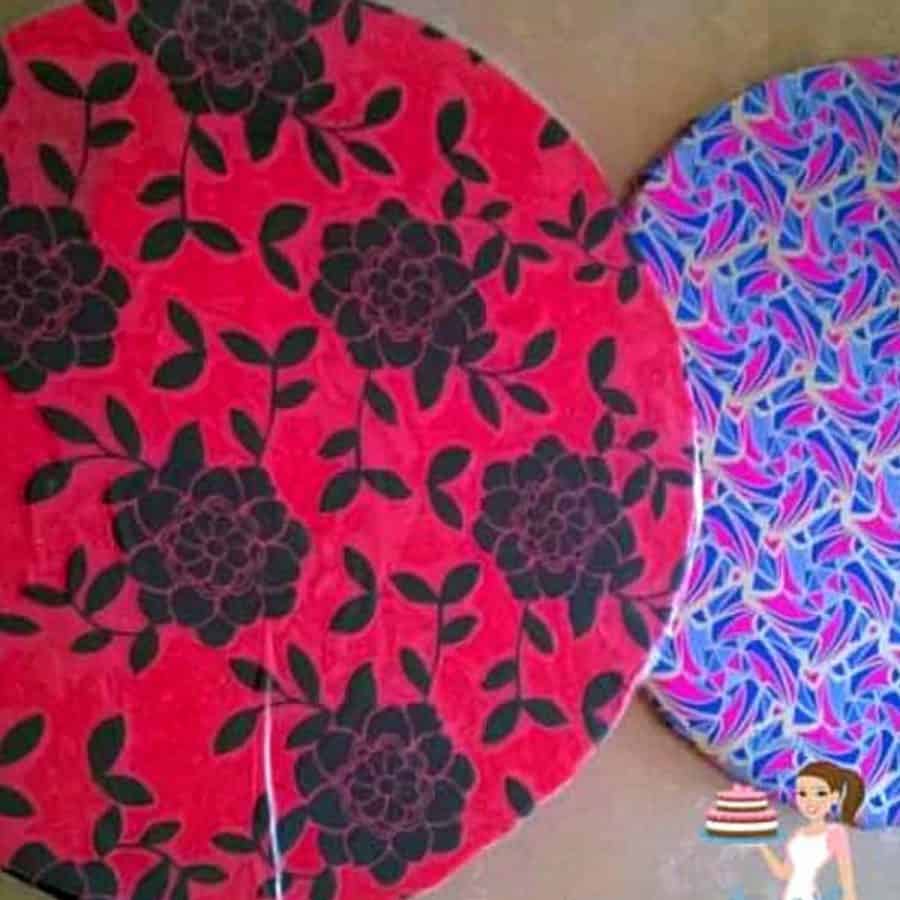 Cake boards covered in wrapping paper.