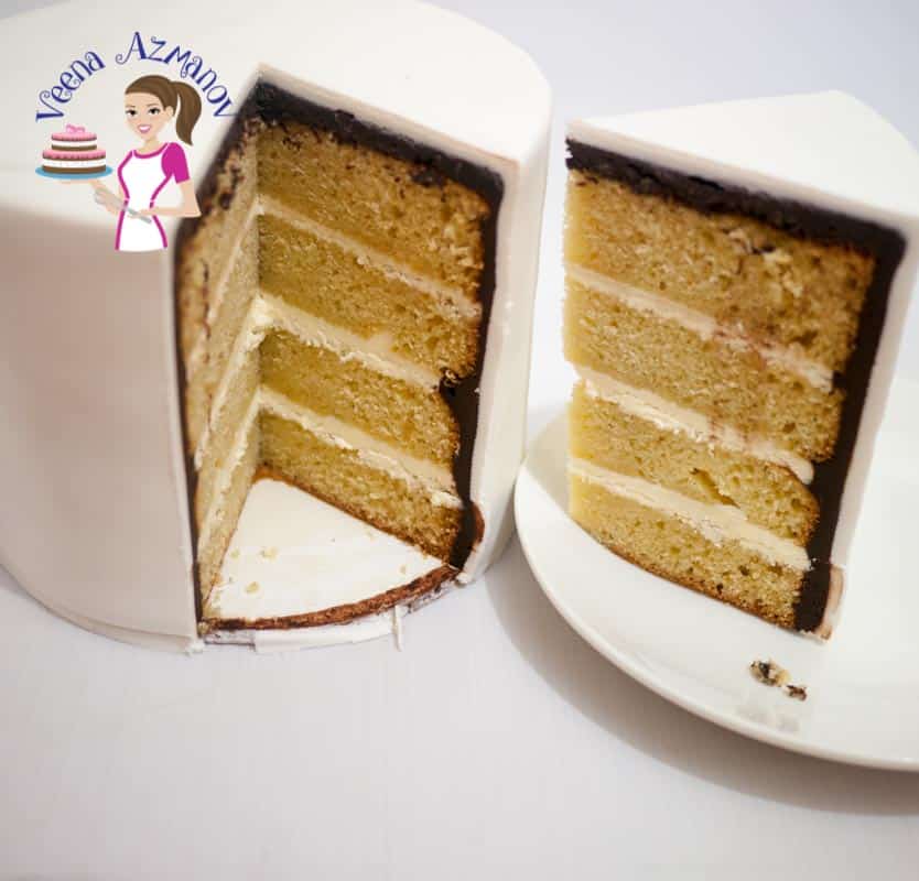 A slice of buttercream layer cake on a plate.