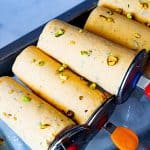 Mango flavor kulfi on ice cube tray.