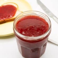 Strawberry jam in a jam jar.
