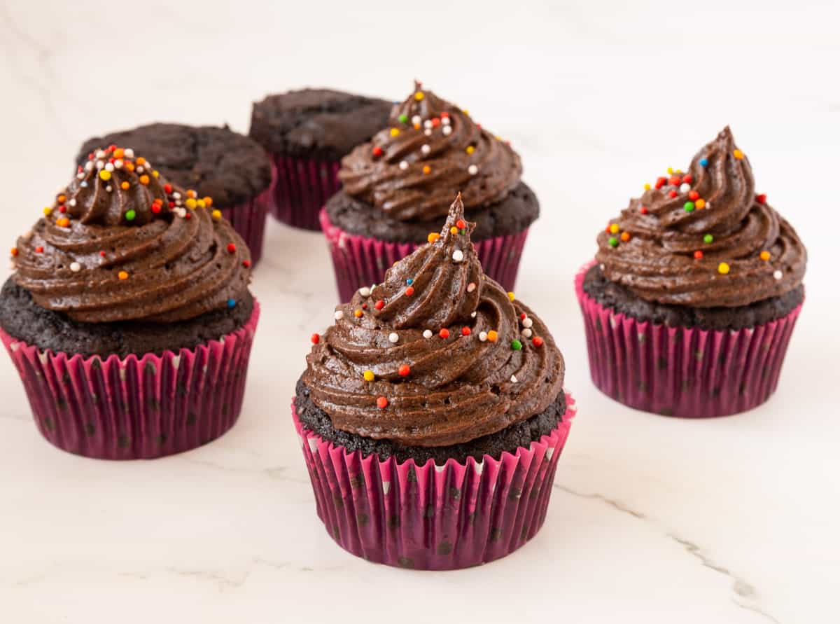 Moist chocolate cupcakes on the table.