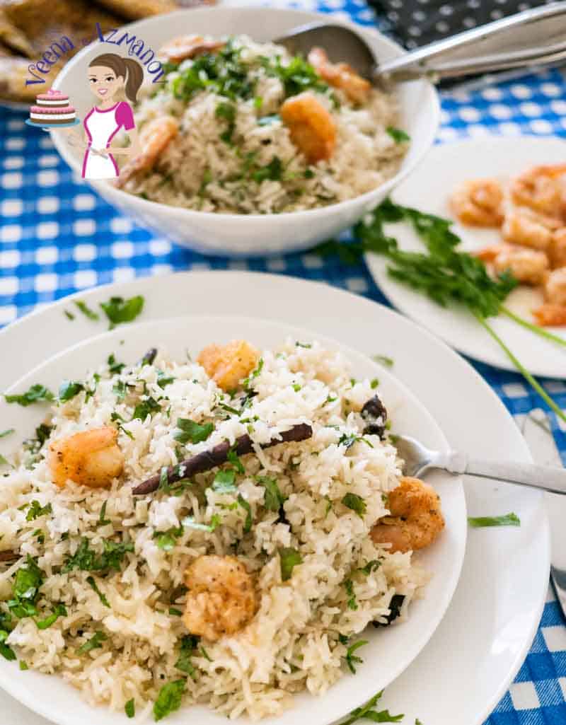 A plate of rice pilaf with prawns.
