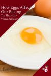 A raw egg on a plate.