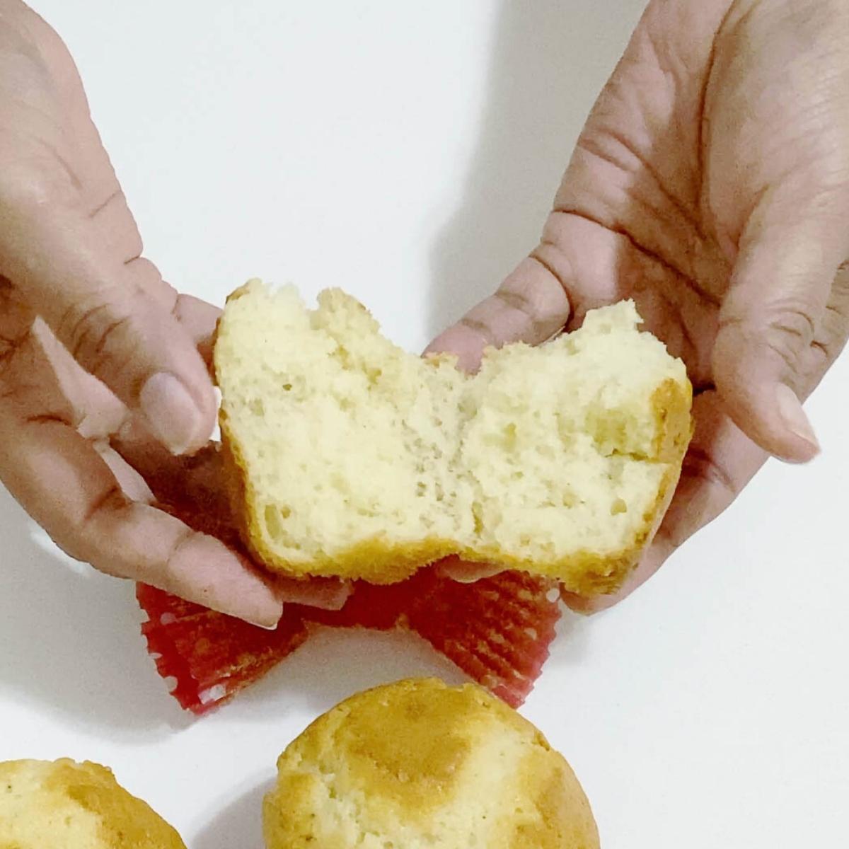 Showing the inside of a light and airy cupcake .
