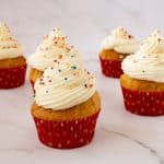 Frosted moist vanilla cupcakes with one bowl buttercream.