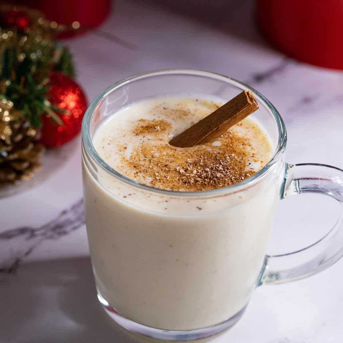A glass with Spiked eggnog recipe.