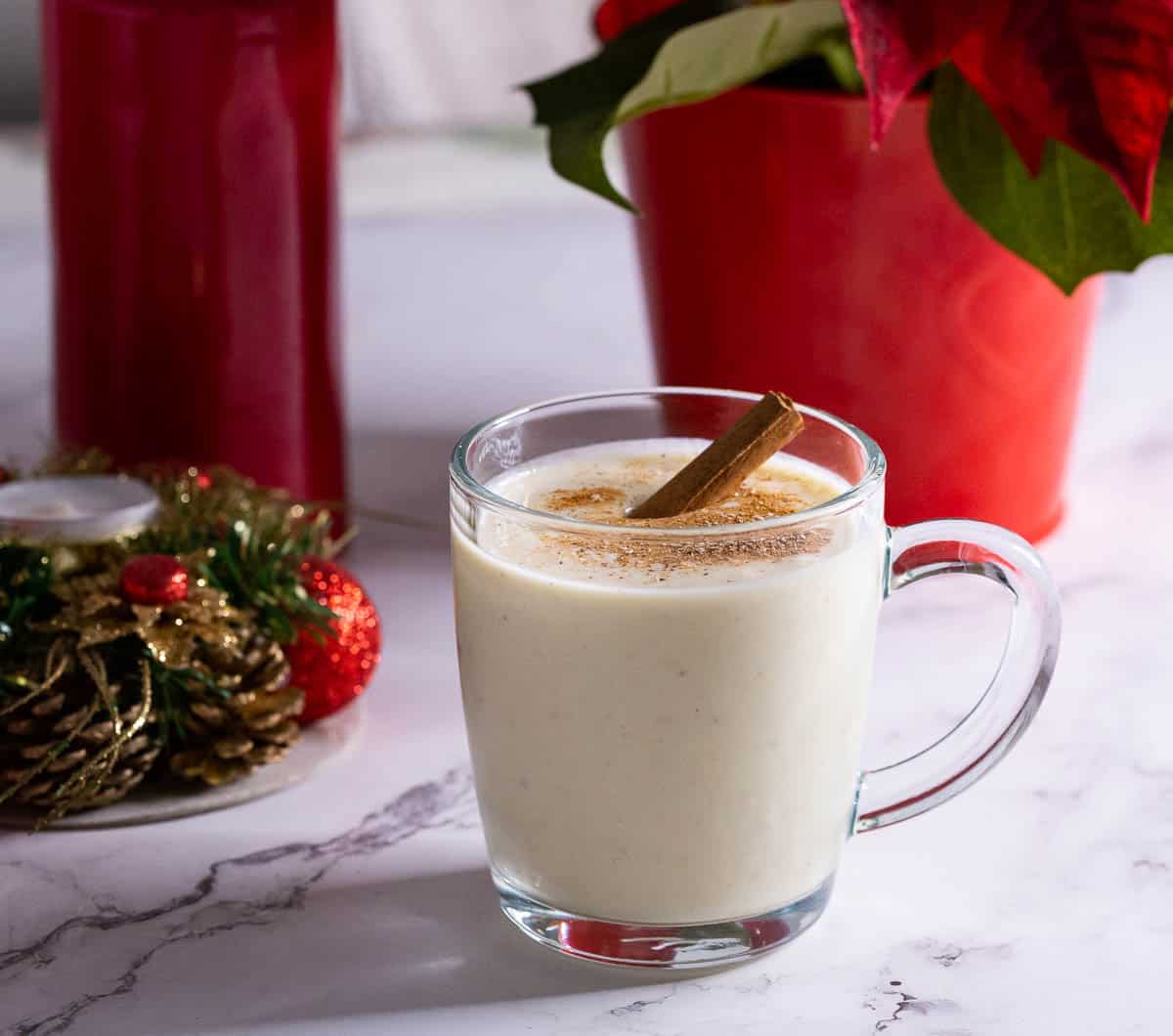 A glass with traditional spiked eggnog recipe.
