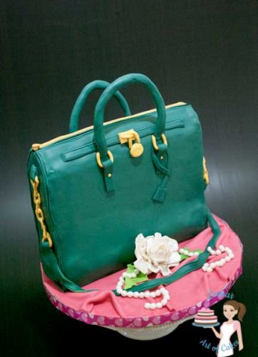 AA cake decorated to look like a lady\'s handbag.