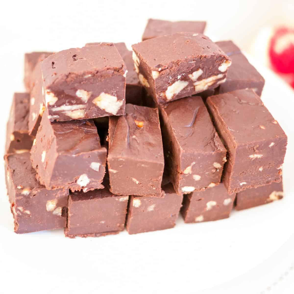Chocolate fudge with nuts on the table.