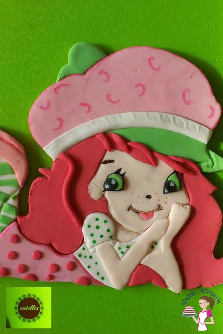 An image of a girl made with fondant.