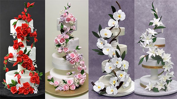 A bouquet of sugar flowers on a cake.